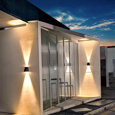 China Wholesale Price Waterproof Outdoor Patio House Decorative Warm White Led Solar Garden Wall Light for sale