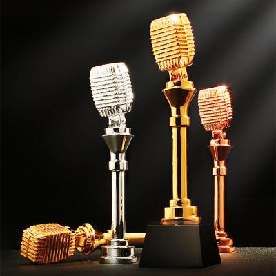 China Hot Sell Support OEM Eco-Friendly Factory Price golden microphone resin molded trophies for sale