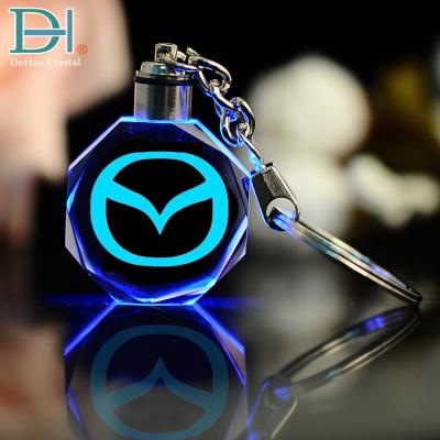 China Cheap Gifts Souvenirs Custom Car Logo Crystal LED Light Keychain for sale