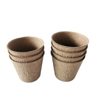 China Grow Seedlings Flower And Vegetable Seedling Cup , Degradable Fruit Round Plant 4 Hole Pulp Seedling Cup for sale