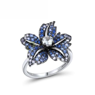 China Fashion P.J. Design Blue Lily Flower 925 Sterling Silver Black White Plating Ring with Blue Nano CZ Blue Spinel for sale