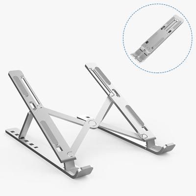 China Adjustable Height (8.5-12cm) Professional Aluminum Portable Foldable Laptop Stand for sale