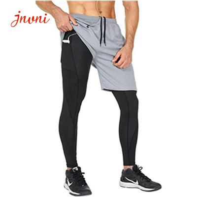 China Os homens 2 nas calças 1 de corrida malham o short Sweatpants do Gym com bolsos do zíper à venda