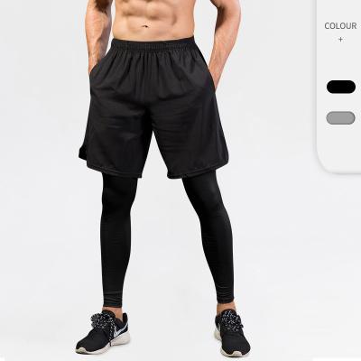 Китай Activewear быстрых сухих людей двойного слоя основывает с внутренними Breathable колготками продается