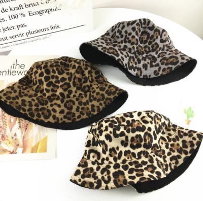 China Foldable Double Sides Picture Leopard Print Fisherman Hats Street Wild Men And Women Umbrella Bucket Hat for sale