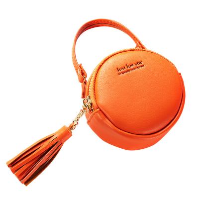 China Hot selling new waist bag simple color PU leather cute fashional bag women wallet with tassels for sale