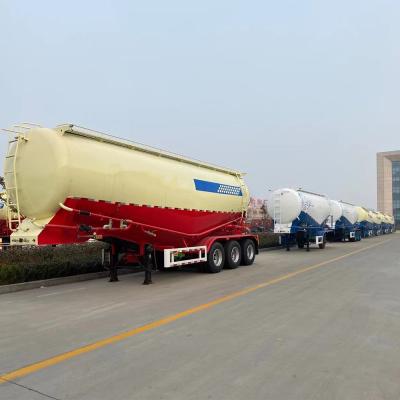 China Forma de V 40cbm 3 eixo tanque seco tanque de pólvora a granel semi-reboque com transporte suave à venda