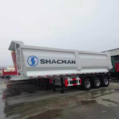 China Peças sobressalentes Técnicas Suporte de tractor de cama plana Trailers de inclinação 3 eixos 40 metros cúbicos à venda