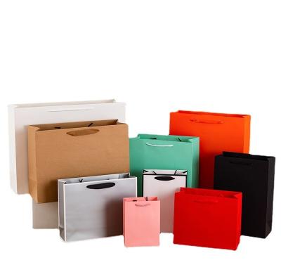 China Gift & Craft Kraft Paper Bags With Handles Clothing Packaging Bag Kraft Paper Bag for sale