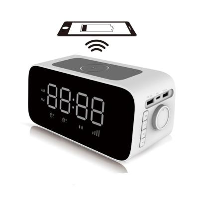 China 2022 modern new innovation gift ac power charging station alarm clock with wireless charger for sale