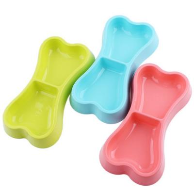 China Double Viable Pet Bowl PP Plastic Dog Bone Shape Cat Drinking Water Combo Pet Food Bowl for sale