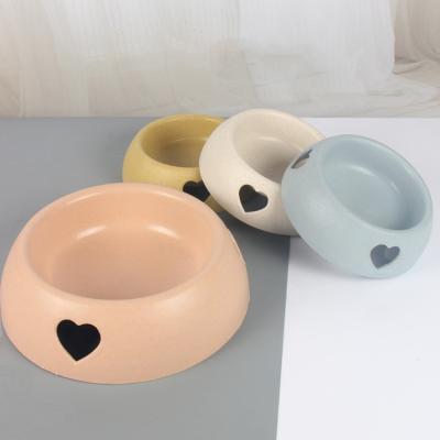 China Sustainable Pet Supplies Simple Cat Dog Bowl Plastic Heart Bowl Pet Cat Bowl for sale