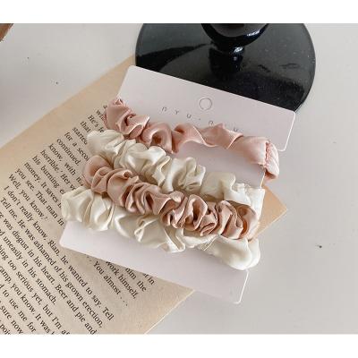 China Beautiful Designer Silk Scrunchies Wholesale Custom Famous Solid Color Brands Luxury Satin Elastic Hair Bands Ties for sale