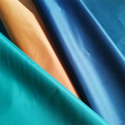 China 190T Anti Pill PU PVC Coated Waterproof 100% Polyester Taffeta Raincoat Fabric for sale