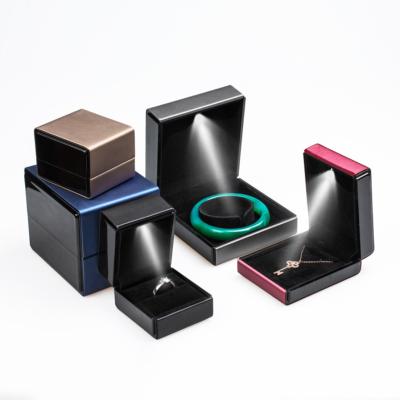 China 2021 Wholesale Jewelry Box Joyero Eco-friendly Jewelry Ring Earring Jewelry Box Led Jewelry Ring Box With Led Light for sale