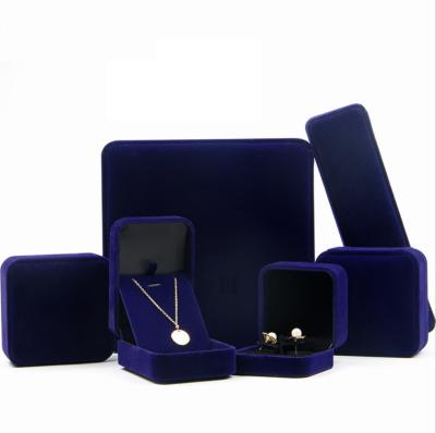 China Eco-friendly Luxury Dark Blue Luxury Jewelry Packaging Box Ring Earring Gift Box Velvet Jewelry Boxes Custom Ring Box for sale