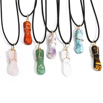 China Wholesale Natural Crystal Fist of Courage Cut Metal Fist Wrapping Reiki Energy Pendant Necklace for sale