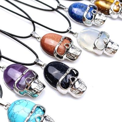 China Skeleton Wholesale Natural Crystal Skull Carving Skull Alloy Inset Necklace Pendant Gift for sale