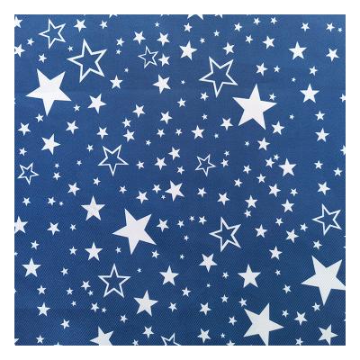 China Popular water-resistant star printed polyester fabric autumn and winter waterproof knitted printed uniform fabric for sale