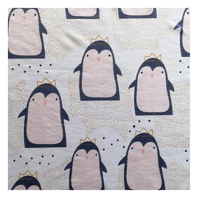 China Antistatic Popular Fabric Penguin Printed Polyester Stretch Knit Milk Silk Apparel Fabric for sale