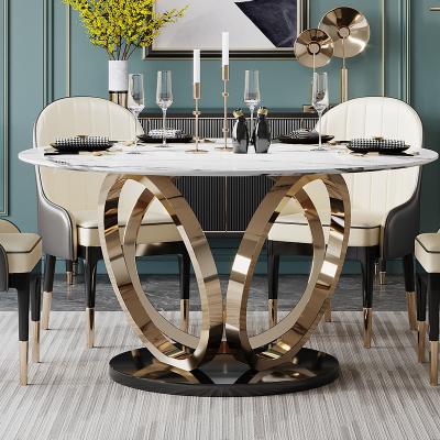 China Luxury Hotel Adjustable Custom Restaurant Gold Iron Chrome (Others) Top Swivel Legs Round Design Marble Dining Table Sets for sale