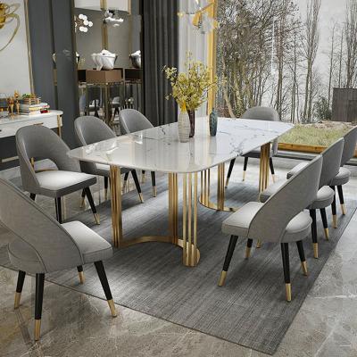 China Adjustable Custom Home Furniture (Other) Dining Room Set Dining Table Gold White Marble and Stainless Steel Velvet Chairs for sale