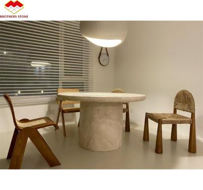 China Mesa de comedor de travertino redonda y beige pulida Muebles de piedra moderna para el salón en venta