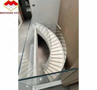 China Indoor Natural Marble Spiral Stairs with Polished Cut-to-Size Treads and Modern Style for sale