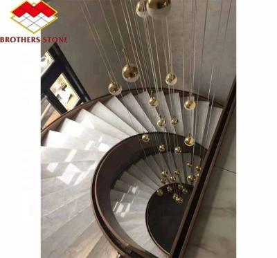 China Hotel Indoor Marble Staircase with Modern Spiral Curved Design and Cut-to-Size Option for sale