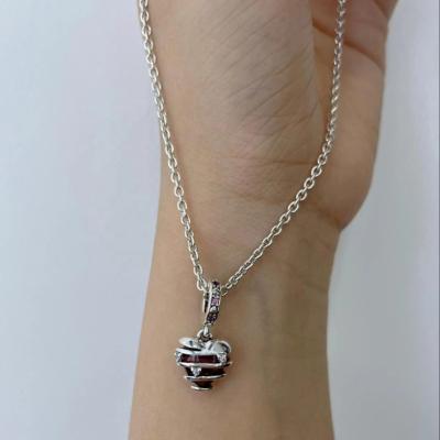 China TRENDY Silver Plated 40+5cm Extension Ruby Stone Diamond Hollow Out Heart Shape Pendant Necklace For Women Girls for sale