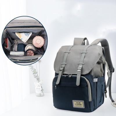 China With Multifunctional Foldable Portable Type Baby Diaper Bag USB Bed USB Travel Mommy Backpack Backpack for sale