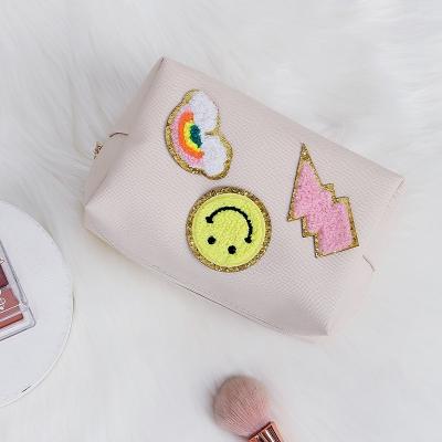 China Factory Fashion Convenient Design Luxury Cute Durable Makeup Letter Travel Zipper Pouch Cosmetic Bag For Ladies for sale