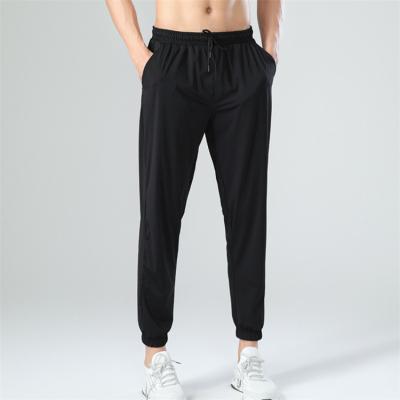 China Geo'Peck Sports Joggers Pants Men's Pockets QUICK DRY Running Training Pants Male for sale