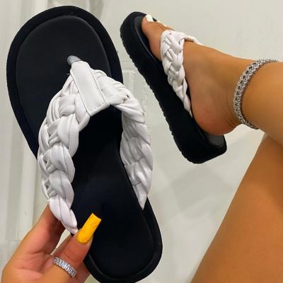 China Fashion trend summer 2021 new weave designs flat thicken unique platform ladies fancy flip flops for sale