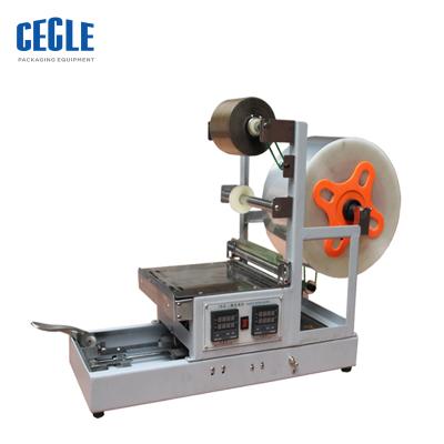 China cd/dvd products machine box overwrapping cosmetic packaging machine for sale