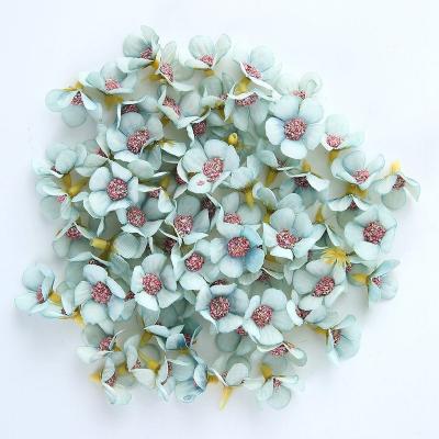 China 50pcs 2cm Daisy Flower Head Mini Silk Eco-friendly Artificial Decor For Home Decor Wedding Diy Garland Headdress Fake Flowers for sale