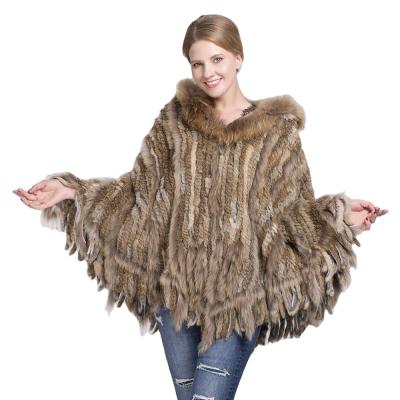 China Real Rabbit Fur and Raccoon Fur Knitted Rabbit Fur Cape with Raccoon Fur Trimming Women's Real Fur Hood Poncho with Tassels for sale