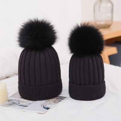 China COMMON Natural Wool Blend Hat Bobble Fur Women Winter Slouchy Beanies for sale