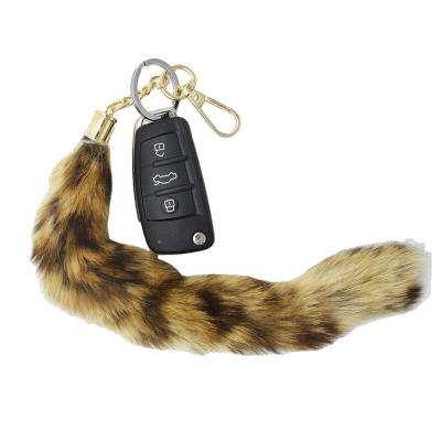 China Natural Real Genuine Soft Fluffy Tail Fur Tail Key Chain Fur Tail Bag Charm for sale