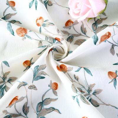 China New QUICK DRY spring/summer polyester flower cutting printed fabric women's children's dress shirt polyester apparel fabric for sale