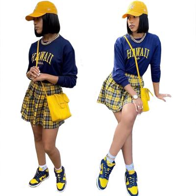 China LD81044 Women Casual Plaid Skirt New Sets Sexy Women Clothing Club O Neck Long Sleeve Printed Letter Pleated Hip Skirt Two Piece Set for sale