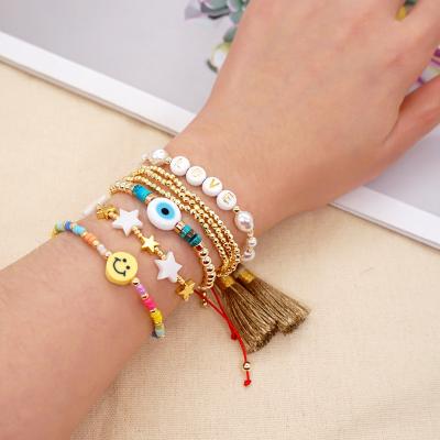 China Go2BoHo BOHEMIA 5 Piece Bracelet Fashion Jewelry Set 2022 Summer Beach Smiley Star Evil Eye Tassel Bead Love Letter Bracelets For Women for sale