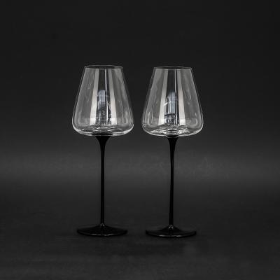 China Viable Luxury Tall Glass Stemware Tall Elegant Black Stem Red Wine Glass Tumblers for sale