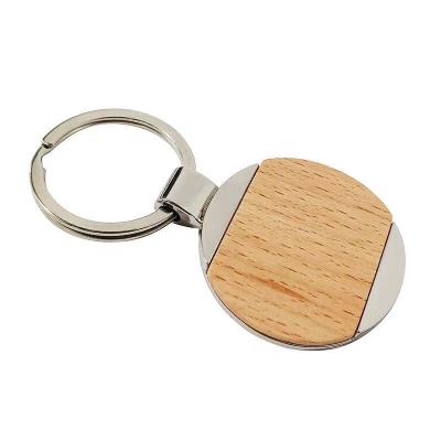 China Advertising/Promotion/Reading Gifts Cheap White Round Shape Alloy Metal Beech Wood Advertising Key Chain Custom Key Chain for sale