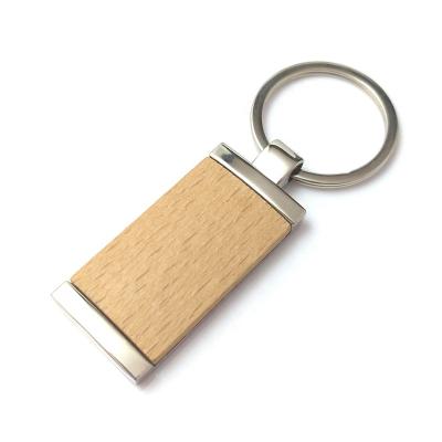 China Advertising/Promotion/Reading Gifts High Polished Laser Key Chain Wholesale Key Chain Logo Blank Advertising Beech Wood Alloy Metal Custom for sale