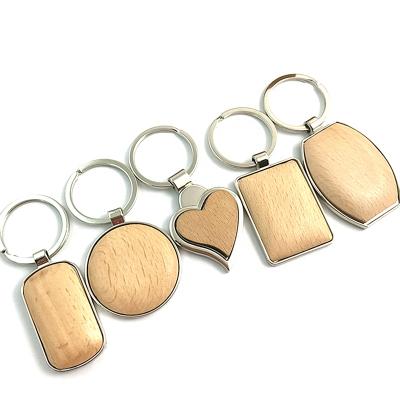 China Advertising/Promotion/Reading Gifts Personalized Quality Wood With Silver Metal Key Ring Ring Laser Engraved Logo Keychain for sale