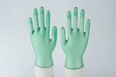 China Powder free green Disposable Vinyl Glove food contact DINP material for sale