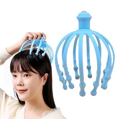 China Relieve Stress Handheld Hair Stimulation Scalp Massager 12 Finger Head Scratcher Roller Balls Head Massager For Deep Relaxation for sale