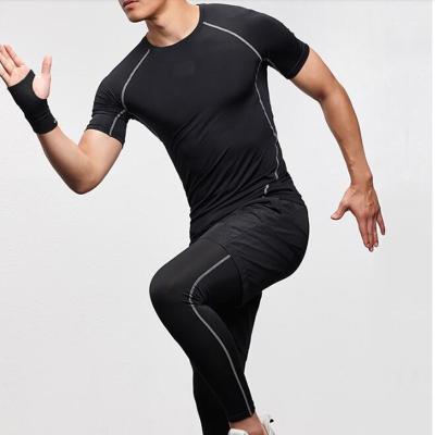 China Breathable Gym Fitness Clothes Running Yoga Training Tight Fits Polyester / Spandex Custom Men's Sport Yoga Leggings for sale