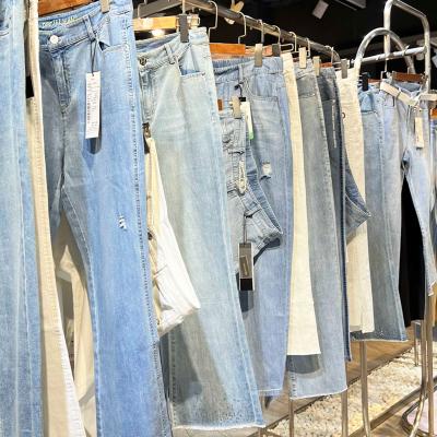 China 2023 Designs 2023 Designs 2023 Overstock Women's Mixed Ripped Jeans Skinny Ripped Wholesale Used Clothing Bales Used Clothes Bales for sale